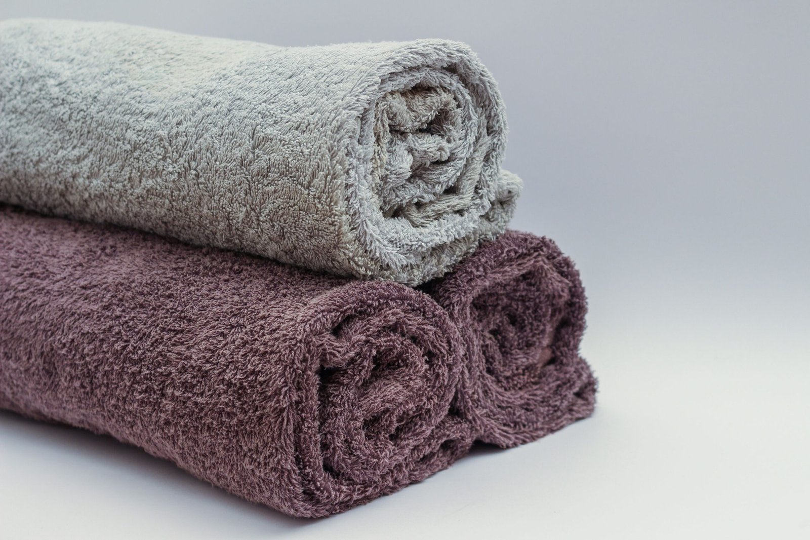 Folded towels on shelf