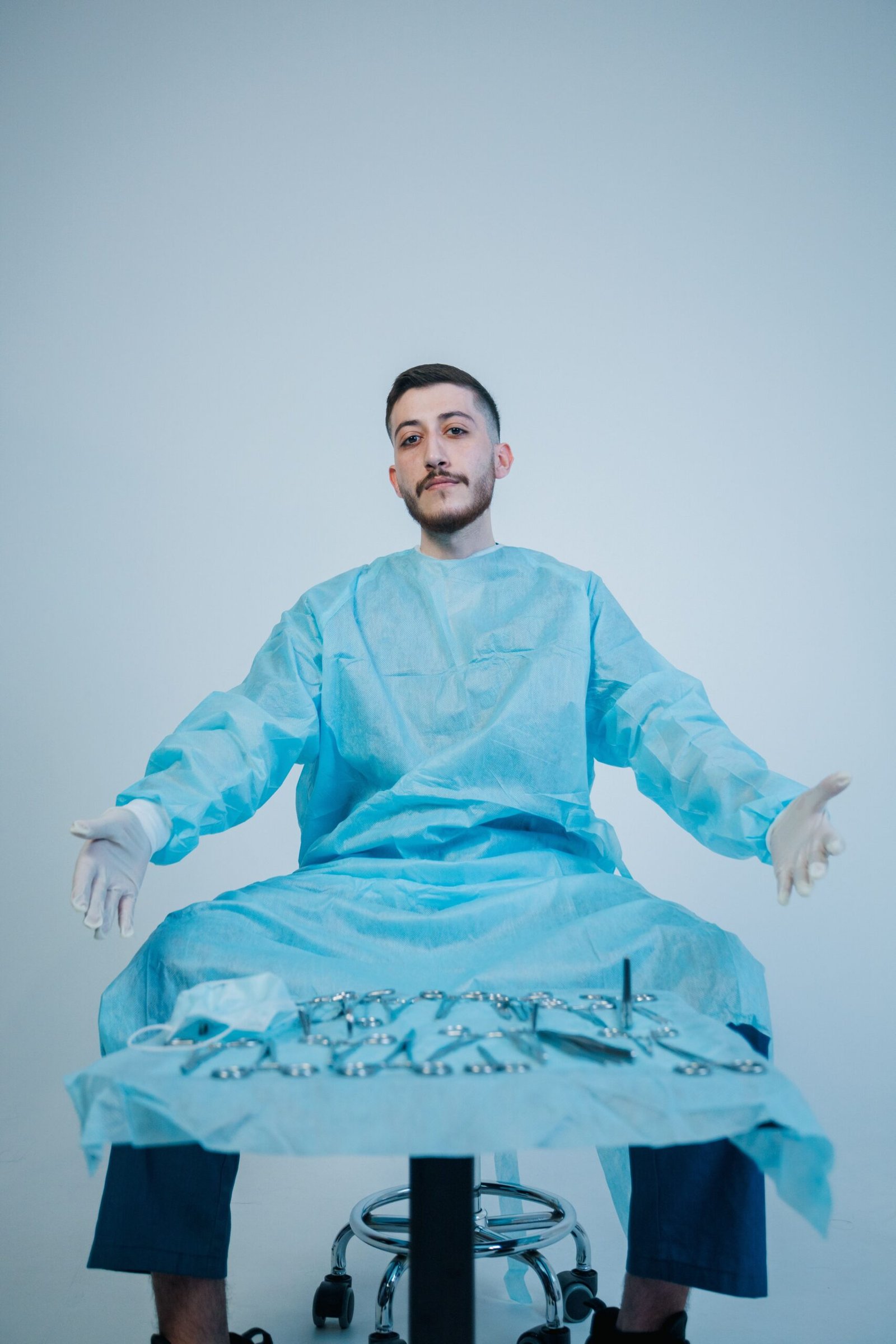 Disposable hospital gown fitting